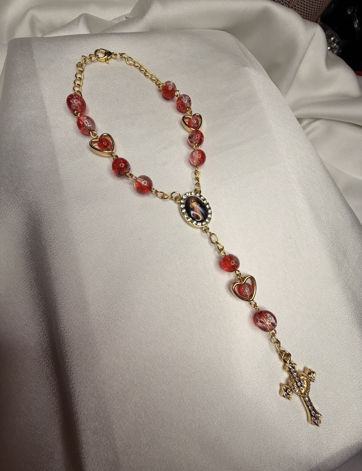 Divine Mercy Car Rosary with red beads, gold hearts and a crystal crucifix