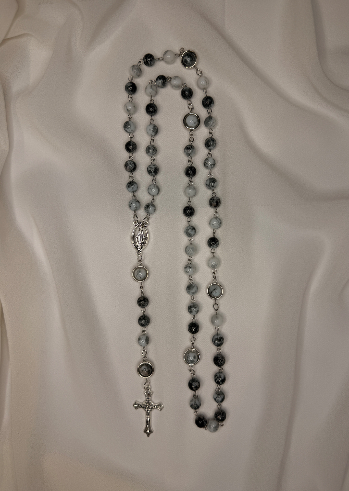 Marbles of Mercy full rosary with black, grey and white marbled stone beads, silver Our Lady centerpiece and ornate silver crucifix